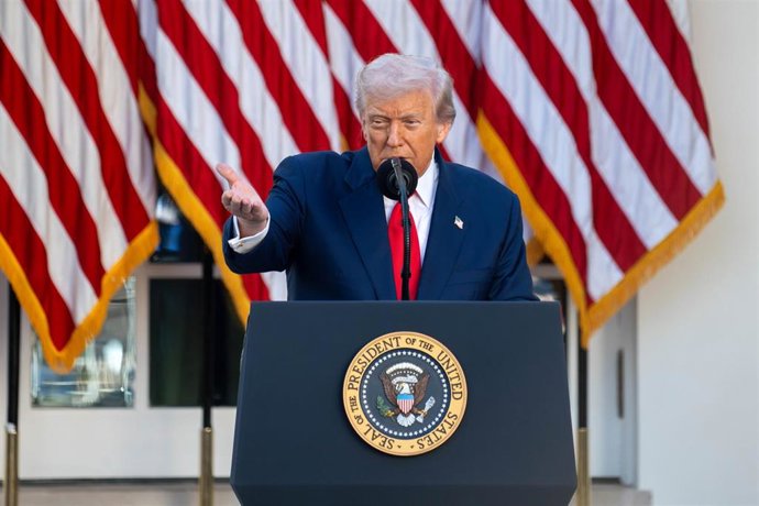 14 October 2025, US, Washington: US President Donald Trump points into the crowd during his speech at the Rose Garden Club at the White House at a Medal of Freedom Ceremony for Charlie Kirk. Photo: Joey Sussman/ZUMA Press Wire/dpa