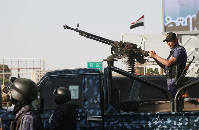 SANAA, Oct. 10, 2025  -- Houthi security soldiers guard during a rally to celebrate a cease-fire between Israel and Hamas, in Sanaa, Yemen, Oct. 10, 2025. Thousands of supporters of Yemen's Houthi group rallied Friday in the capital, Sanaa, to celebrate a