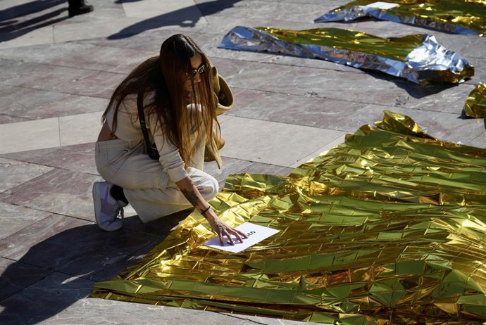 Ato de denúncia e homenagem às vítimas da dana na Plaza de la Virgen, em 29 de outubro de 2025, em Valência, Comunidade Valenciana (Espanha). O evento foi organizado pela Acord Social Valencià.