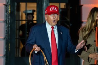 October 30, 2025, Washington, District Of Columbia, USA: President DONALD TRUMP yells to the crowd at the end of the 2025 White House Halloween trick-or-treat event.,Image: 1049329571, License: Rights-managed, Restrictions: , Model Release: no, Credit lin