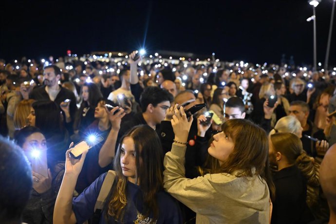 November 1, 2025, Novi Sad, Serbia, Serbia: People are lighting their phone flashlights during 16 minutes of silence for the 16 victims of the platform collapse at the Kej area, on the banks of the Danube, during memorial gathering in Novi Sad on the firs