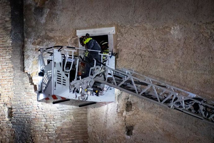 November 3, 2025, Rome, Rm, Italy: Following the collapse of part of the medieval Torre dei Conti, near the Colosseum, a restoration worker gets trapped inside the building by the rubble. The Fire Brigade's Search and Rescue team manages to free the trapp