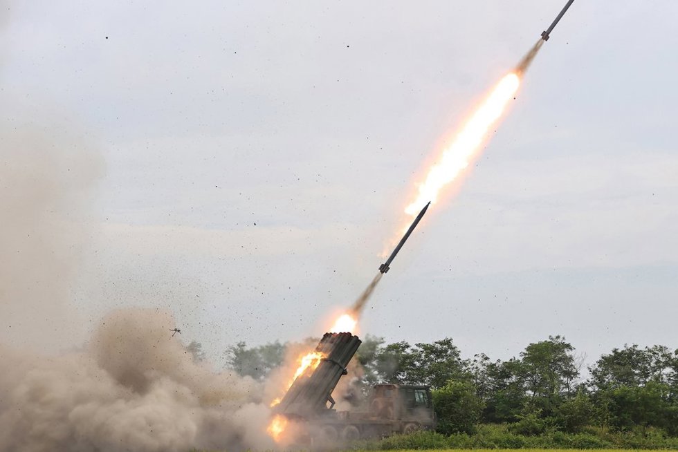 HANDOUT - 27 August 2024, North Korea, ---: A photo released by North Korea's official Korean Central News Agency (KCNA) on August 28, 2024, shows a test-fire of a 240mm multiple rocket launch system (MRLS) being produced at defence industrial