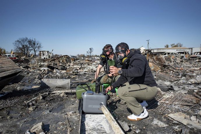 November 5, 2025, Louisville, Ky, United States of America: Members of the Kentucky National Guard 41st Civil Support Team use a portable gas chromatograph mass spectrometer to test for airborne toxic chemicals at the site of a fatal civilian airplane cra