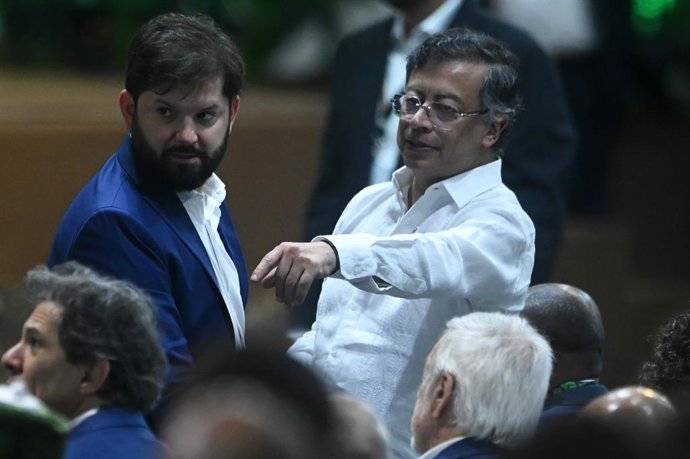 BELEM, Nov. 7, 2025  -- Chilean President Gabriel Boric (L) and Colombian President Gustavo Francisco Petro Urrego attend the climate summit in Belem, northern Brazil, Nov. 6, 2025. A two-day climate summit was held to discuss pressing climate change chal