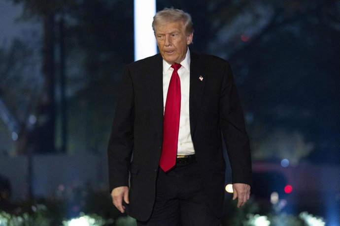 November 9, 2025, Washington, District Of Columbia, USA: United States President Donald J Trump walks toward the residence after stepping off Marine One on the South Lawn of the White House in Washington, DC, USA, 09 November 2025. President Trump is retu