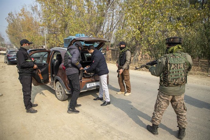 November 13, 2025, Pulwama, Jammu And Kashmir, India: Indian policemen search a car during a surprise operation in south Kashmir following a car explosion near the Red Fort. High security alerts were deployed in several Indian states that tightened securi