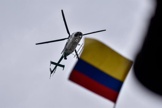 Archivo - February 8, 2024, Bogota, Cundinamarca, Colombia: A Colombian police helicopter flies during a demonstration demanding Colombia's Supreme Court to elect the countries new attorney general in Bogota, Colombia, February 8, 2024.
