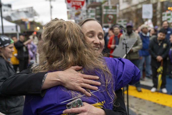 November 13, 2025, Seattle, Washington, USA: Seattle mayor-elect Katie Wilson hugs an SEIU rep as Starbucks baristas and SEIU members rally outside the former Starbucks Reserve Roastery during a Red Cup Rebellion strike over alleged unfair labor practices