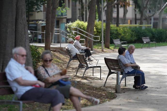 Varias personas en un parque, a 17 de septiembre de 2025
