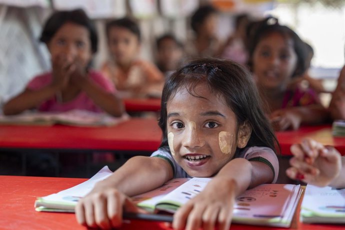 A young Rohingya girl follows a lesson in a temporary learning centre in Cox’s Bazar, Bangladesh - home of the world’s largest refugee camp.  ECW