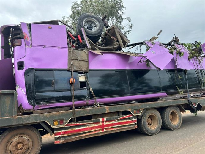 KAMPONG THOM, Nov. 20, 2025  -- A truck carries the wreckage of a crashed bus in Kampong Thom province, Cambodia, on Nov. 20, 2025. Thirteen people were killed and 24 others injured after a bus crashed into a bridge's rail and plunged into a river in cent