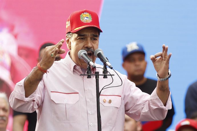 CARACAS, Dec. 2, 2025  -- Venezuelan President Nicolas Maduro speaks during a rally in Caracas, capital of Venezuela, Dec. 1, 2025. Venezuela does not want "a slave's peace," Venezuelan President Nicolas Maduro told supporters Monday as U.S. military depl