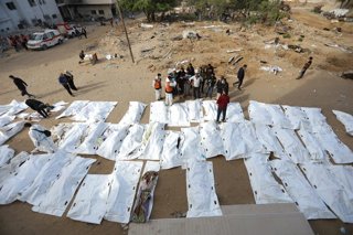 December 8, 2025, Gaza City, Gaza Strip, Palestinian Territory: Civil Defense teams continue to recover the bodies of more than 400 Palestinians from the Al-Shifa Medical Complex in Gaza City, after they were found in the hospital's yards and departments 