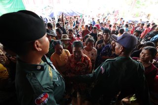 BEIJING, Dec. 12, 2025  -- Cambodian evacuees wait for relief items distribution at a safe zone in Siem Reap province, Cambodia, on Dec. 11, 2025. At least 10 Cambodian civilians have been killed and 60 others wounded in the latest round of border conflic