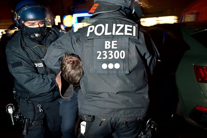 December 13, 2025, Berlin, Berlin, Germany: Police arrest a demonstrator on a chockehold during the annual demonstration against Police in Berlinâ€s district Friedrichshain on Dec. 13, 2025