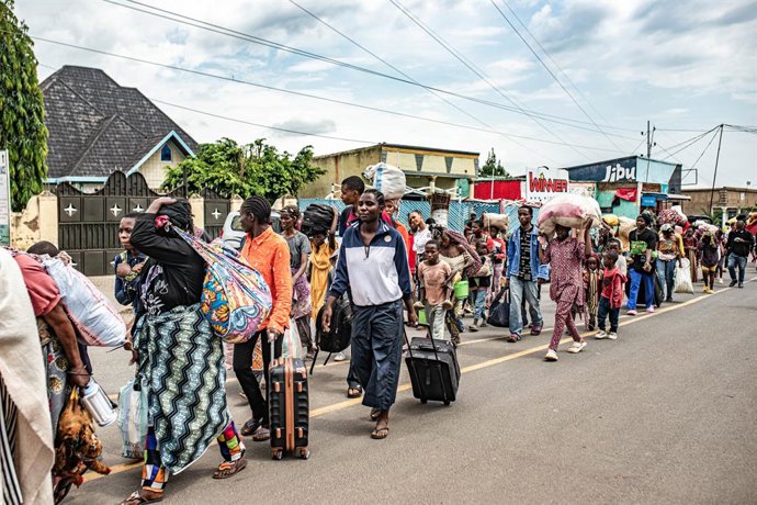 BUGARAMA, Dec. 7, 2025  -- Displaced people from the Democratic Republic of the Congo (DRC) are seen in the town of Bugarama in neighboring Rwanda, on Dec. 5, 2025. The March 23 Movement (M23) rebels have expanded their operations across several areas of 