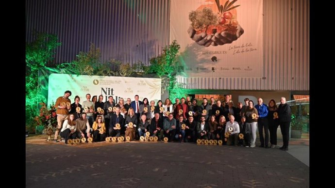 Los premiados durante el acto