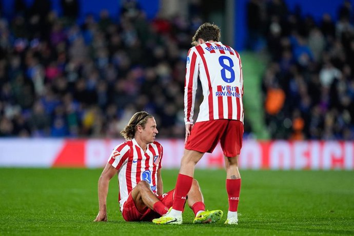 Marcos Llorente of Atletico de Madrid gets injured during the Spanish League, LaLiga EA Sports, football match played between Getafe CF and Atletico de Madrid at Coliseum de Getafe stadium on November 23, 2025, in Getafe, Spain.