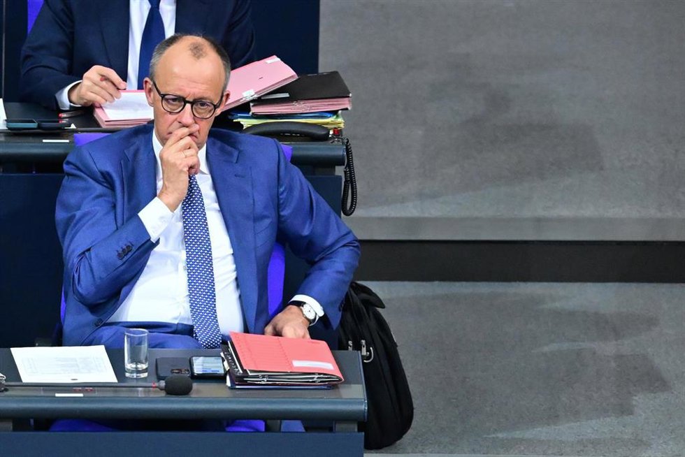 17 December 2025, Berlin: German Chancellor Friedrich Merz sits in the 49th plenary session of the 21st legislative period in the German Bundestag. Following a government questioning and the Chancellor's government statement on the EU summit taking plac