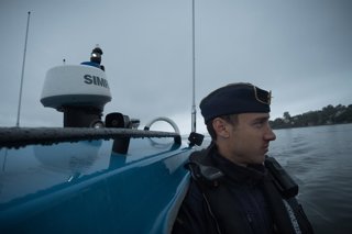 Archivo - July 25, 2023, DalarÃ, Sweden: Swedish Coast Guard officer enroute to Swedish Coast Guard vessel KBV 031.  The there divers will be dispatched to inspect an undersea wreck believed to be the warship BODEKULL that sank in the 17th century. This w