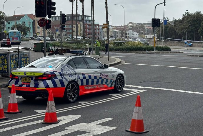 AUSTRALIA, SYDNEY - DECEMBER 15, 2025: A police car is seen near Sydneyâ€s Bondi Beach following the December 14th terrorist attack, where two gunmen opened fire during a Hanukkah celebration, leaving at least 15 people dead and 42 wounded