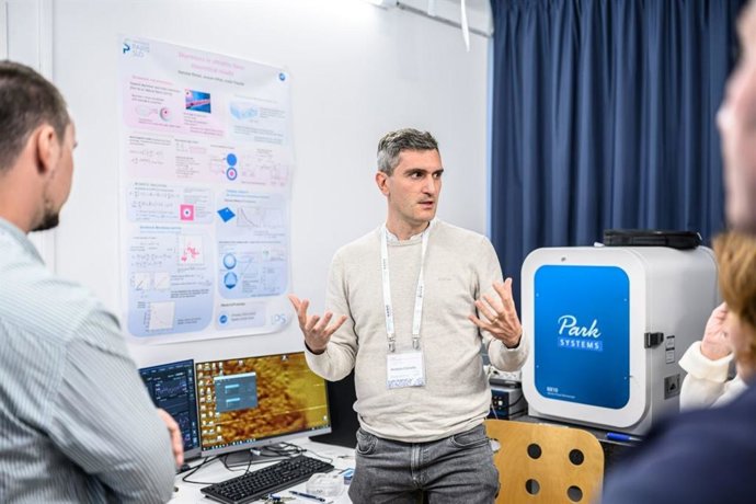 Park Systems' staff explaining about Park AFM tool at NANOscientific Forum Europe 2025