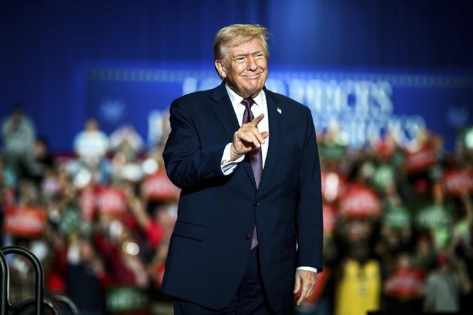 December 19, 2025, Rocky Mount, Nc, United States of America: U.S. President Donald Trump, gestures as he arrives onstage to deliver remarks on the economy at the Rocky Mount Event Center, December 19, 2025 in Rocky Mount, North Carolina.