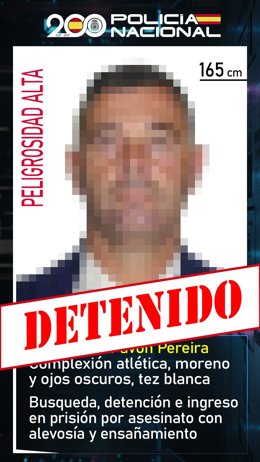 Cartel con la foto del fugado, ya detenido.
