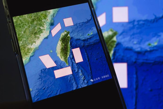 December 29, 2025, Taichung, Taiwan: An illustration map released by China's Eastern Theater Command showing locations of the military drills is displayed on a smartphone. China - The Chinese People's Liberation Army (PLA) on Monday announced  military dr