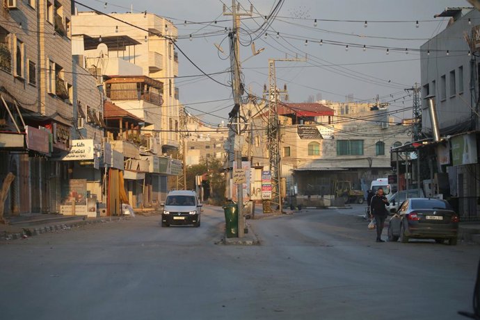 December 26, 2025, Jenin, West Bank, Palestine: General view of the commercial market after the shops closed in the town of Qabatiya, south of Jenin in the northern West Bank. The Israeli army announced it was conducting operations in several locations in