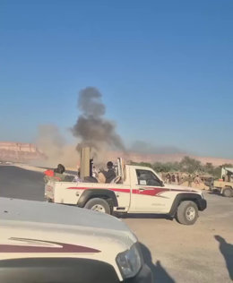 HADRAMOUT, Dec. 26, 2025  -- This video screenshot shows militants affiliated with the Southern Transitional Council (STC) near the site of airstrikes in Hadramout, Yemen, Dec. 26, 2025. Saudi warplanes on Friday carried out airstrikes on military sites a