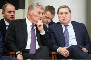 RUSSIA, ST PETERSBURG - DECEMBER 21, 2025: Russian Presidential Press Secretary Dmitry Peskov and Aide Yuri Ushakov (L-R front) attend an expanded meeting of the Supreme Eurasian Economic Council at Boris Yeltsin Presidential Library