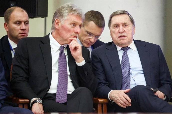 RUSSIA, ST PETERSBURG - DECEMBER 21, 2025: Russian Presidential Press Secretary Dmitry Peskov and Aide Yuri Ushakov (L-R front) attend an expanded meeting of the Supreme Eurasian Economic Council at Boris Yeltsin Presidential Library