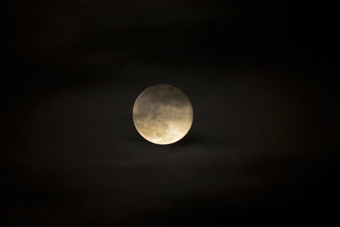 December 5, 2025, Lisbon, Portugal: The moon seen rising in the skies of Lisbon. Mother Nature decided to display the final supermoon of the year, known as the Cold Supermoon. At its full phase and coinciding with its perigee, the satellite was located ju