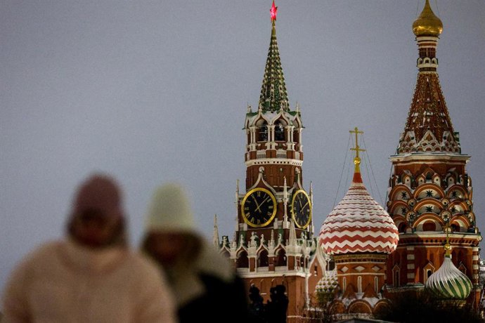 RUSSIA, MOSCOW - DECEMBER 31, 2025: A view of the Spasskaya Tower of the Moscow Kremlin and St Basil's Cathedral