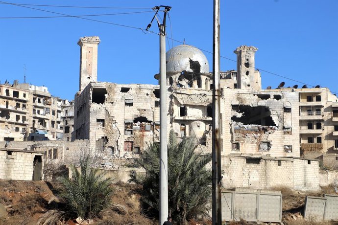 ALEPPO, Jan. 10, 2026  -- Damaged buildings are seen in the Sheikh Maqsoud neighborhood in Aleppo, northern Syria, Jan. 10, 2026. The Syrian interim government on Friday accused the Kurdish-led Syrian Democratic Forces (SDF) of violating withdrawal arrang