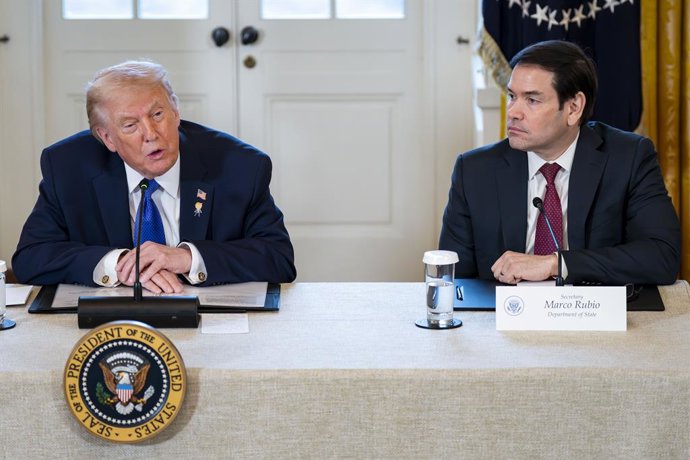 January 9, 2026, Washington, District Of Columbia, USA: United States Secretary of State Marco Rubio looks on as US President Donald J Trump speaks during a meeting with oil and gas executives in the East Room of the White House in Washington, DC, USA, on