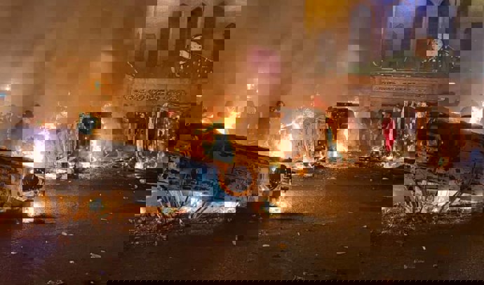 January 10, 2026, Tehran, Iran: A vehicle is set on fire during protests in Tehran, Iran. The nationwide protests started in late December at Tehranâ€s Grand Bazaar in response to worsening economic conditions.