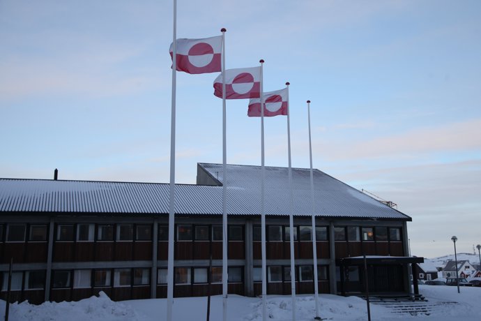 FILED - 05 February 2025, Greenland, Nuuk: Greenlandic flags fly in front of the Inatsisartut parliament in the capital Nuuk. Greenland is electing a new parliament on March 11.