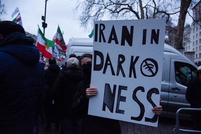 January 11, 2026, London, United Kingdom: A protestor holds a placard during the ''Free Iran From The Islamic Republic'' Protest at Downing St. For the past two weeks, Iran has experienced sustained, nationwide protests openly challenging the regime estab