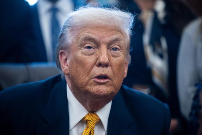 January 14, 2026, Washington, District Of Columbia, USA: United States President Donald J Trump speaks near a container of milk during a signing ceremony allowing schools to serve whole and 2% milk in the Oval Office of the White House in Washington, DC, 