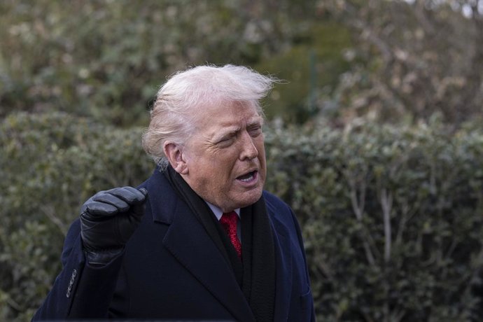 January 16, 2026, Washington, District Of Columbia, United States: U.S. President Donald Trump speaks to members of the press before boarding Marine One on the South Lawn of the White House as he departs for Palm Beach, Florida. Trump is traveling to atte