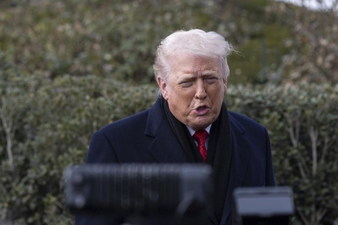 January 16, 2026, Washington, District Of Columbia, United States: U.S. President Donald Trump speaks to members of the press before boarding Marine One on the South Lawn of the White House as he departs for Palm Beach, Florida. Trump is traveling to atte