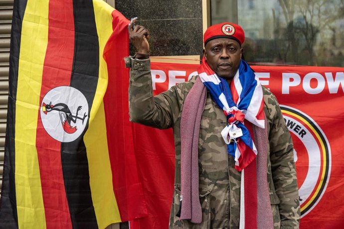 January 17, 2025, London, United Kingdom: An activist poses with his Ugandan flag during the demonstration outside the Ugandan High Commission. Three activists from the People Power, Our Power movement protested outside the Uganda High Commission on the T