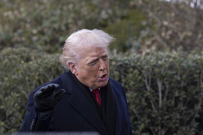January 16, 2026, Washington, District Of Columbia, United States: U.S. President Donald Trump speaks to members of the press before boarding Marine One on the South Lawn of the White House as he departs for Palm Beach, Florida. Trump is traveling to atte