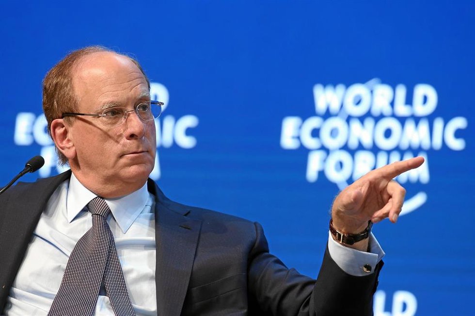 Laurence Fink, Chairman and Chief Executive Officer, BlackRock, USA points into the audience during the session 'The Global Economic Outlook' at the Annual Meeting 2015 of the World Economic Forum at the congress centre in Davos, January 24, 2015.