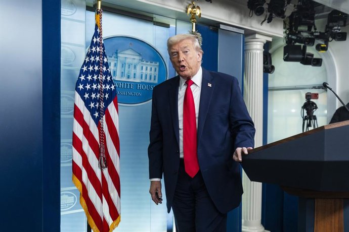 January 20, 2026, Washington, District Of Columbia, USA: US President Donald Trump departs a press briefing with reporters at the White House in Washington, DC, USA, 20 January 2026. Trump spoke about Immigration and Customs Enforcement (ICE) arrests in M