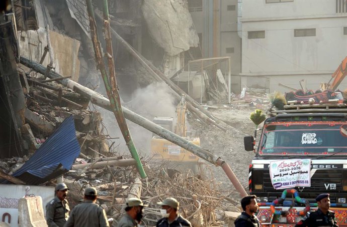 January 23, 2026, Pakistan: KARACHI, PAKISTAN, JAN 23: Heavy machineries are busy in removing debris after fire .broken out incident at Gul Plaza shopping mall, at M.A Jinnah road in Karachi on Friday, .January 23, 2026. A catastrophic fire that broke out