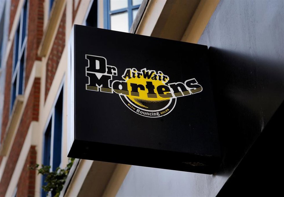 Archivo - FILED - 11 March 2015, United Kingdom, London: A view of a Dr Martens sign on the front of their shop in London. The new boss of Dr Martens is to reveal his strategy to get the bootmaker back on track amid a slump in sales. Photo: Lauren Hurle